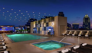 Outdoor pool, open 6:00 AM to 10:00 PM, cabanas (surcharge)