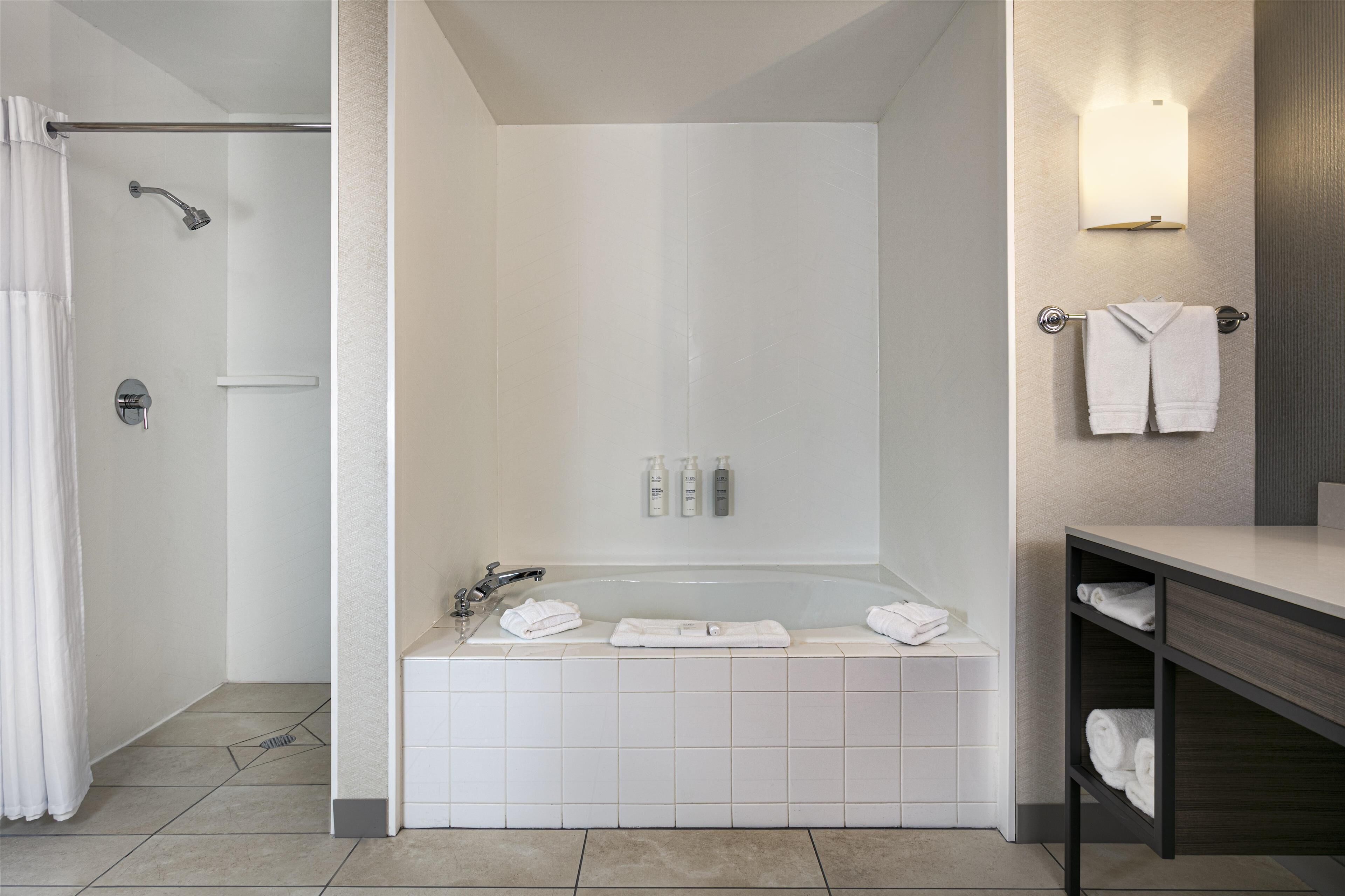 combined shower/bathtub, free toiletries, hair dryer, towels