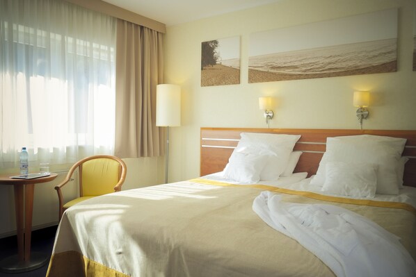 Sengetøy av topp kvalitet, minibar, safe på rommet og lydisolert