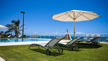 2 outdoor pools, sun loungers