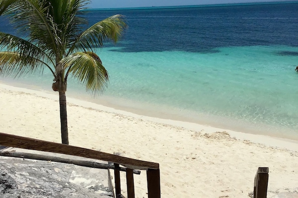 Beach nearby, white sand, sun loungers, beach umbrellas