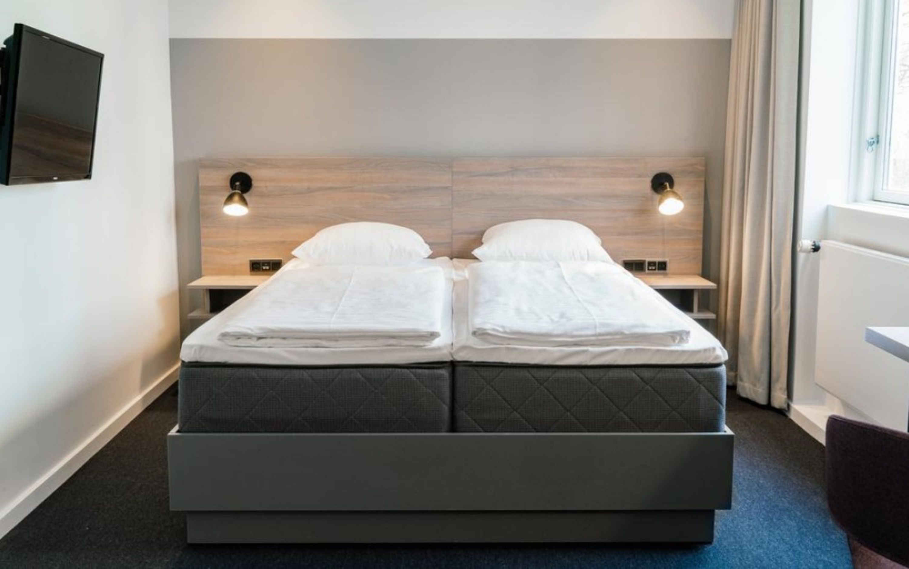 Desk, iron/ironing board (on request), WiFi (free), bed sheets