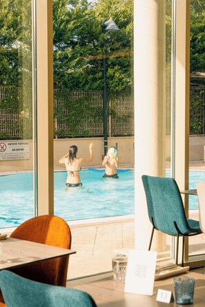 Breakfast, lunch, dinner served; international cuisine, pool views