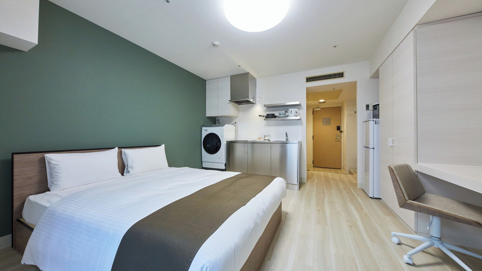 Escrivaninha, cortinas blackout, Wi-Fi de cortesia, roupa de cama