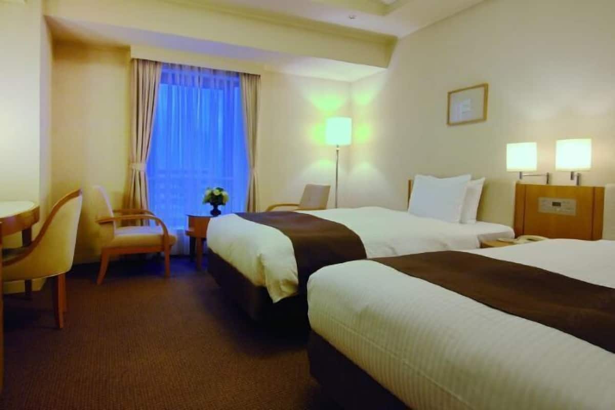Desk, blackout curtains, free WiFi, bed sheets