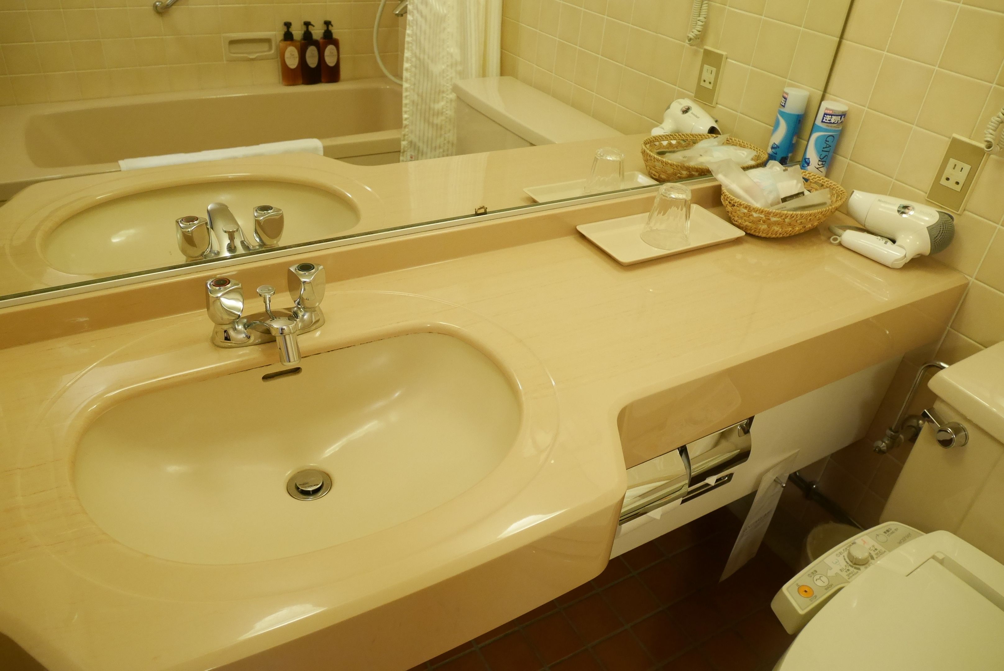 bathtub, free toiletries, hair dryer, slippers