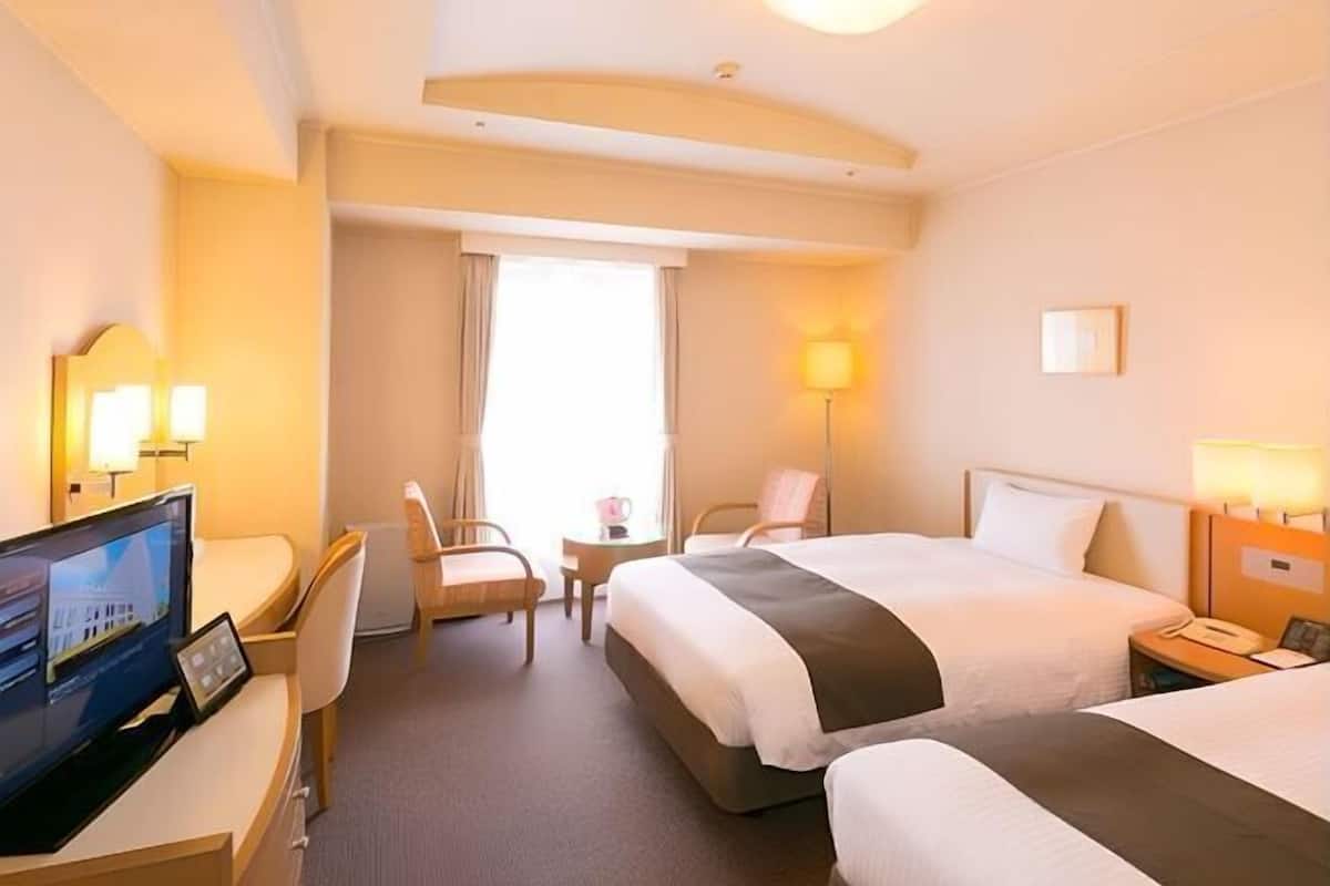 Desk, blackout curtains, free WiFi, bed sheets