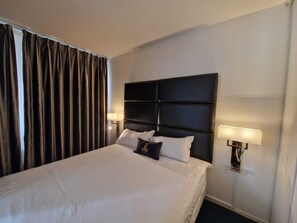 Apartment | 1 bedroom, premium bedding, blackout drapes, iron/ironing board