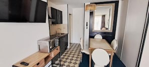Mini-fridge, microwave, stovetop, dishwasher