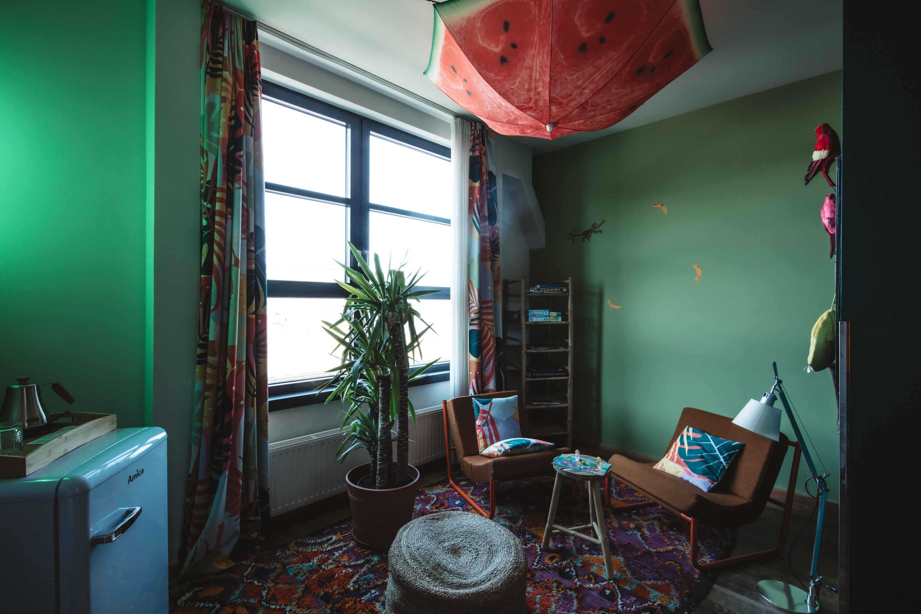 superior quadruple room joy | living area | flat-screen tv