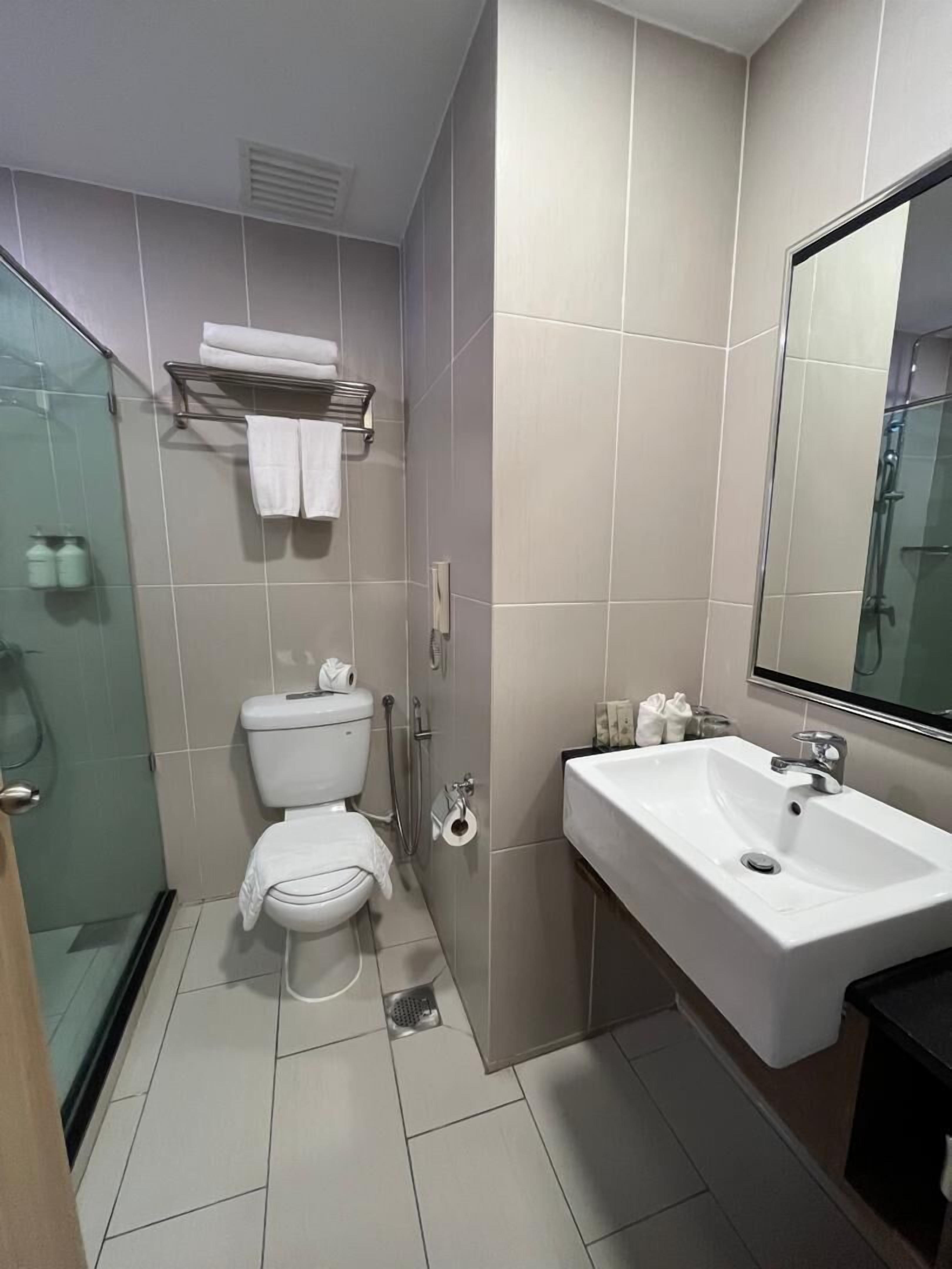 shower, free toiletries, slippers, bidet