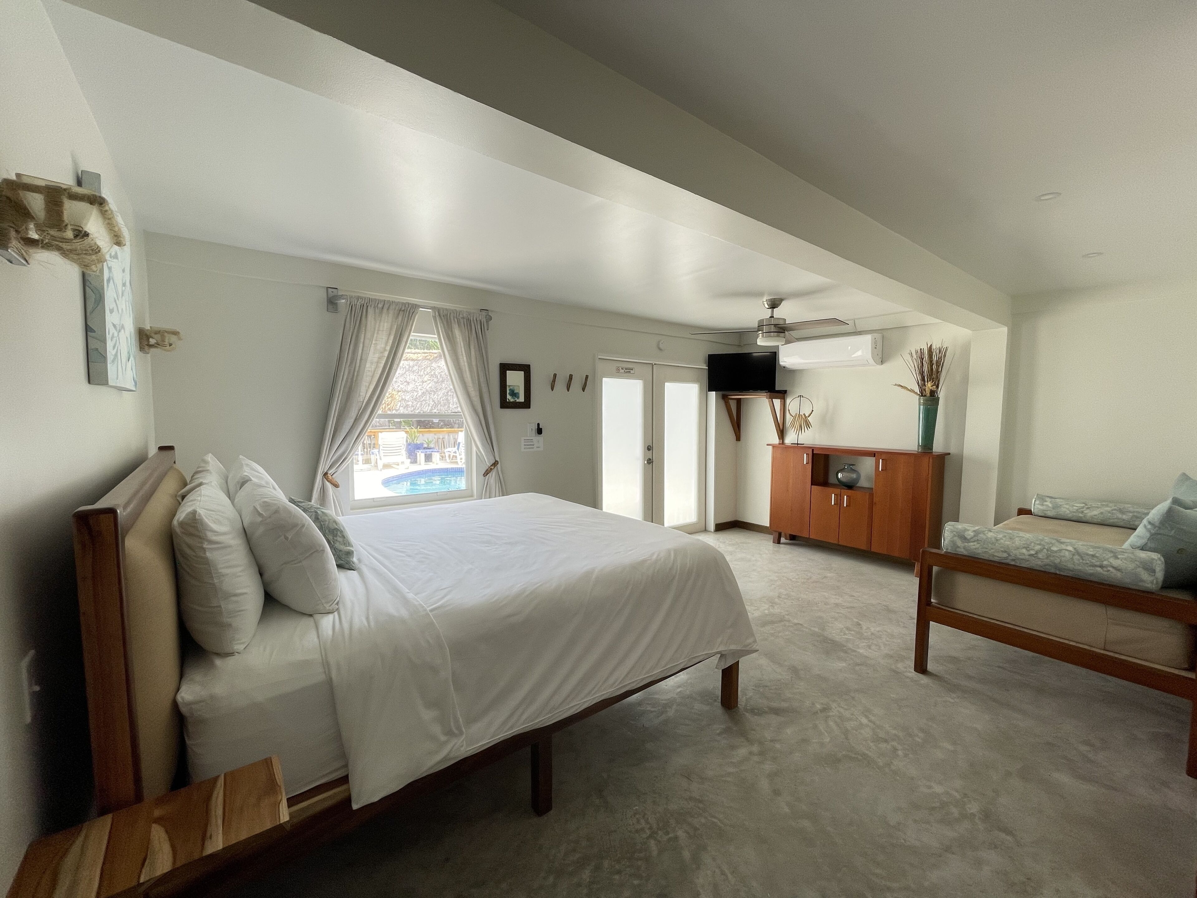 ocean view junior suite pool deck: king | living area | 32-inch led tv with digital channels, netflix, streaming services