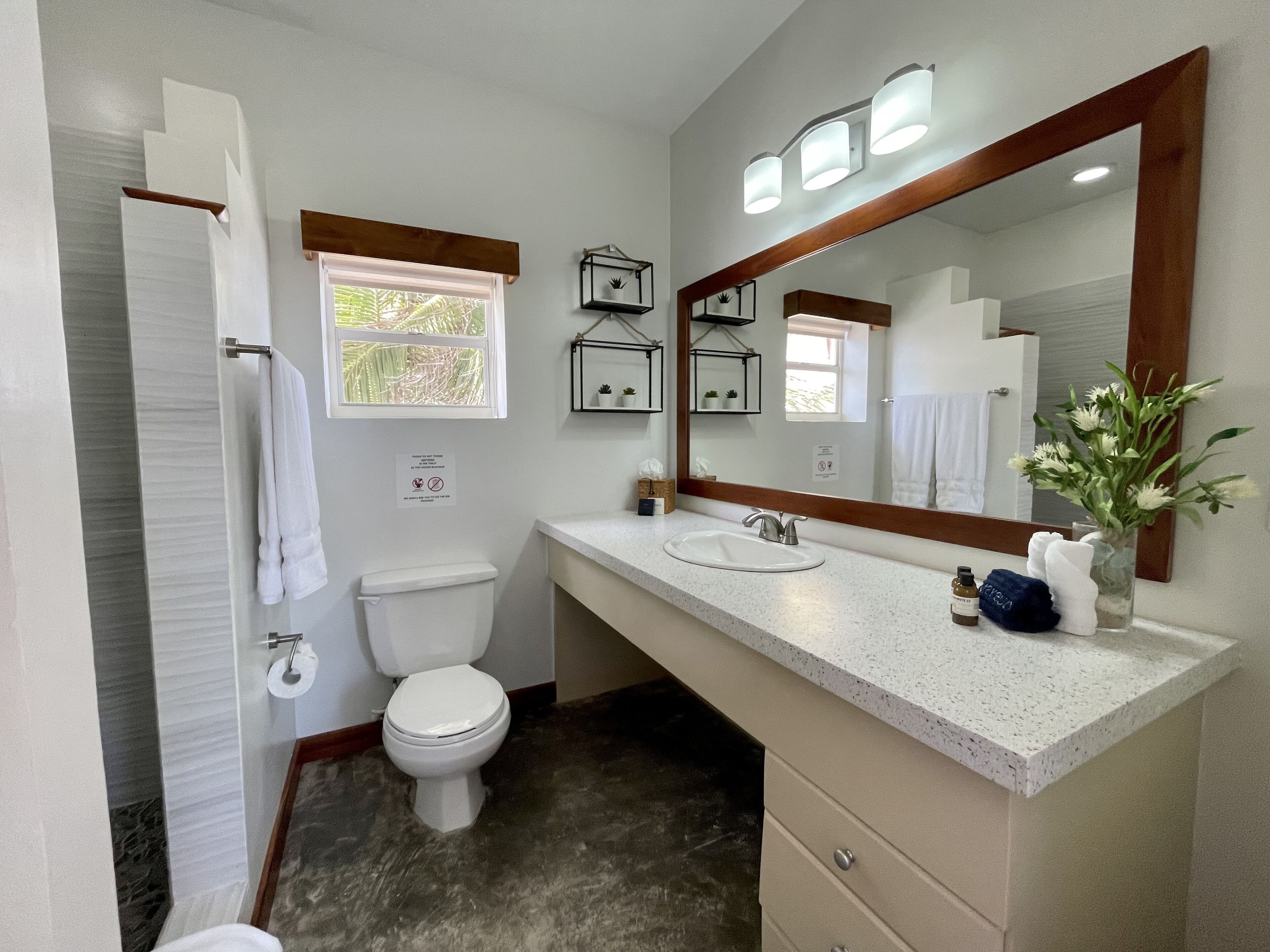 oceanfront junior suite - 1 king bed | bathroom | shower, designer toiletries, hair dryer, towels