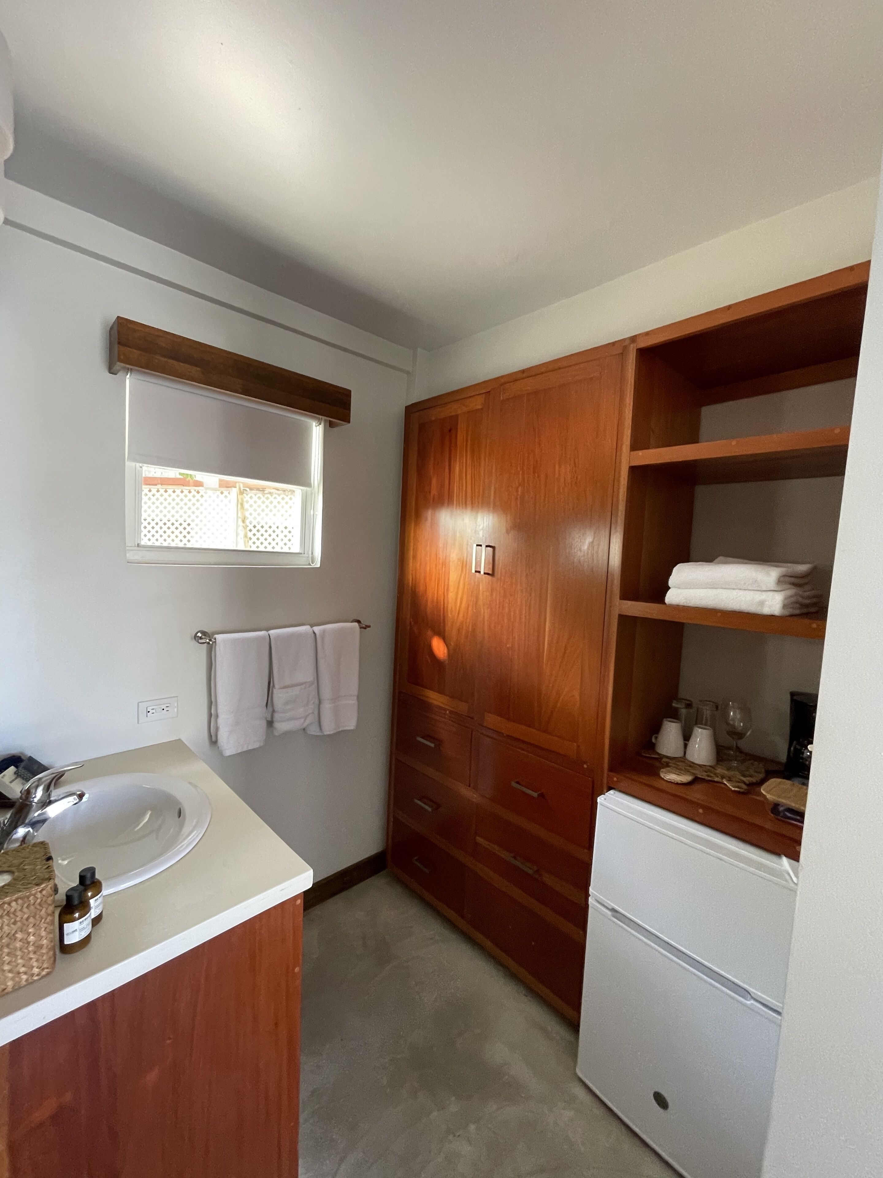 ocean view pool deck room | bathroom | shower, designer toiletries, hair dryer, towels