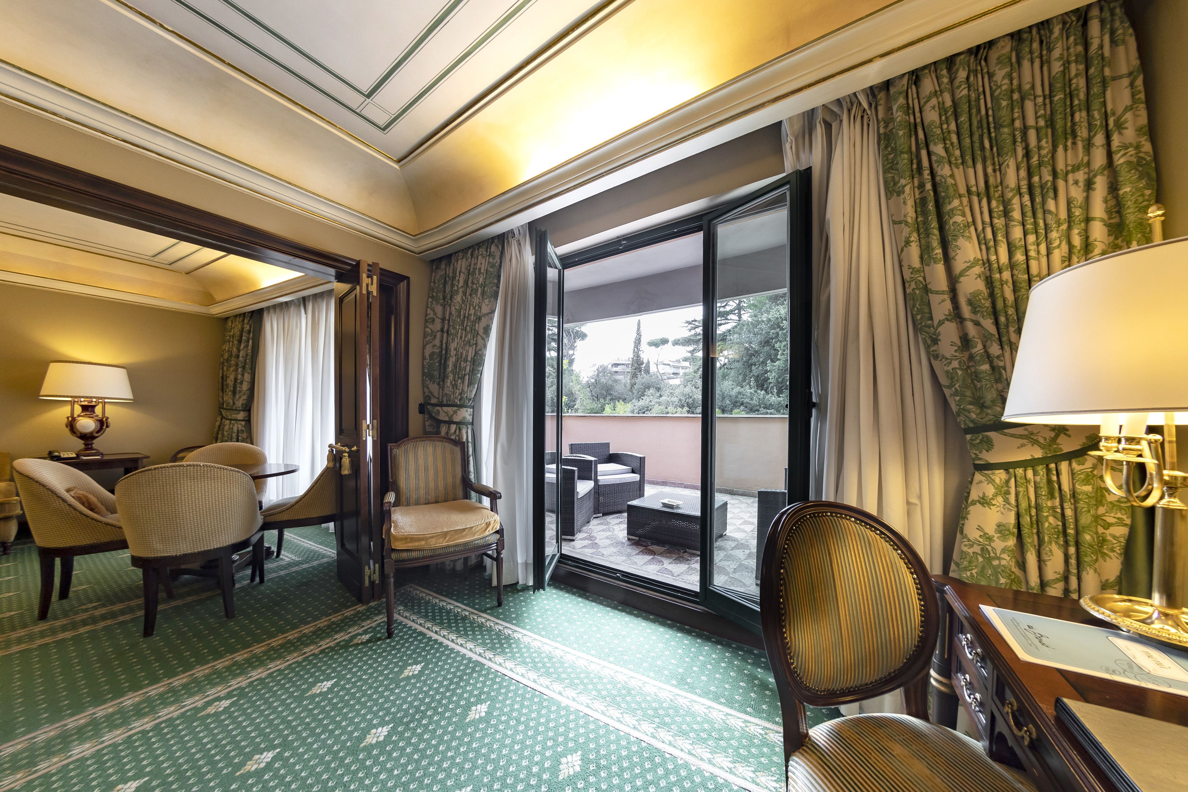 presidential suite | living room | 32-inch flat-screen tv with satellite channels, pay films