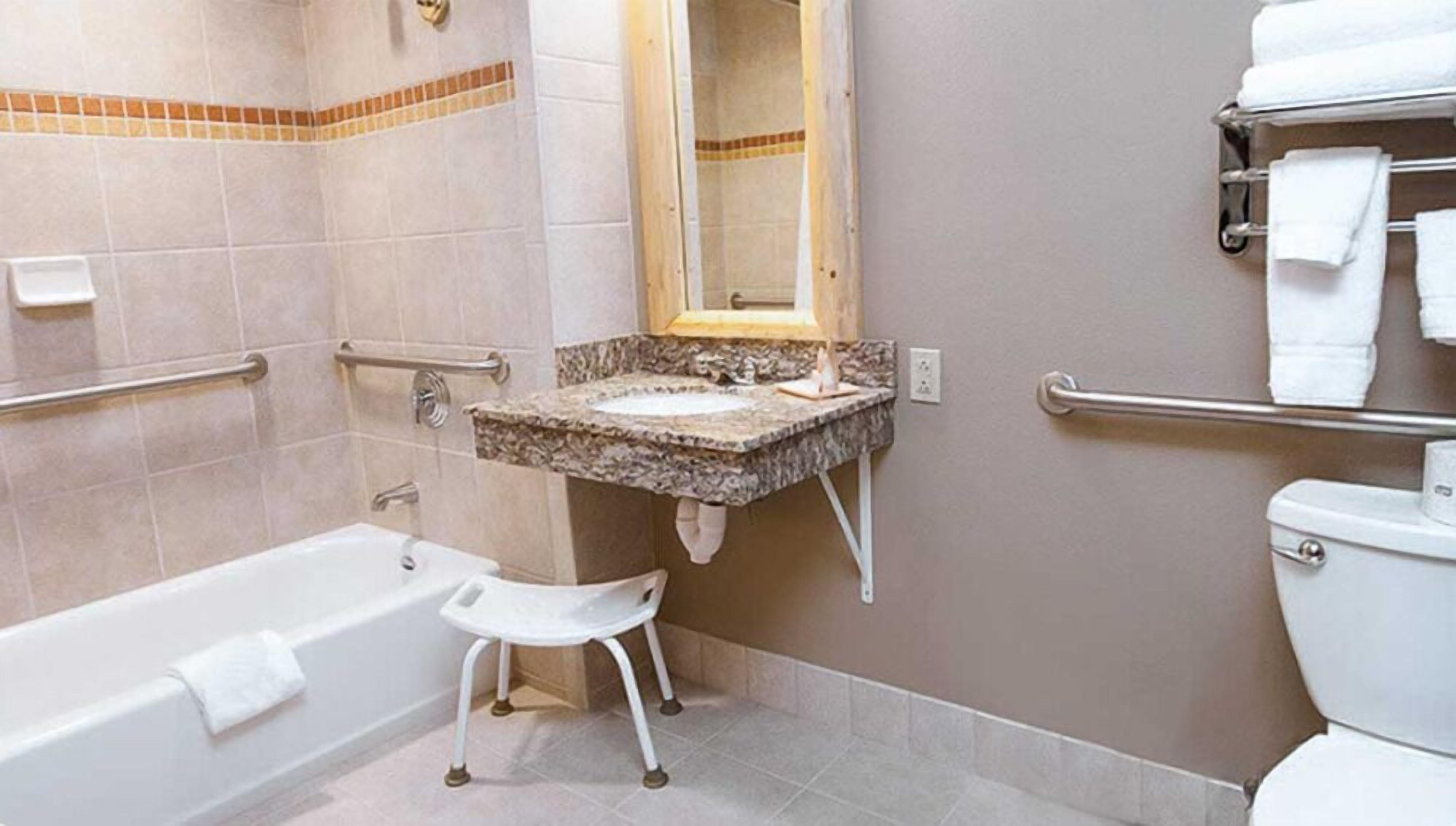 Suite, Accessible (Queen Sofa, Bathtub) | Bathroom | Combined shower/tub, hair dryer, towels
