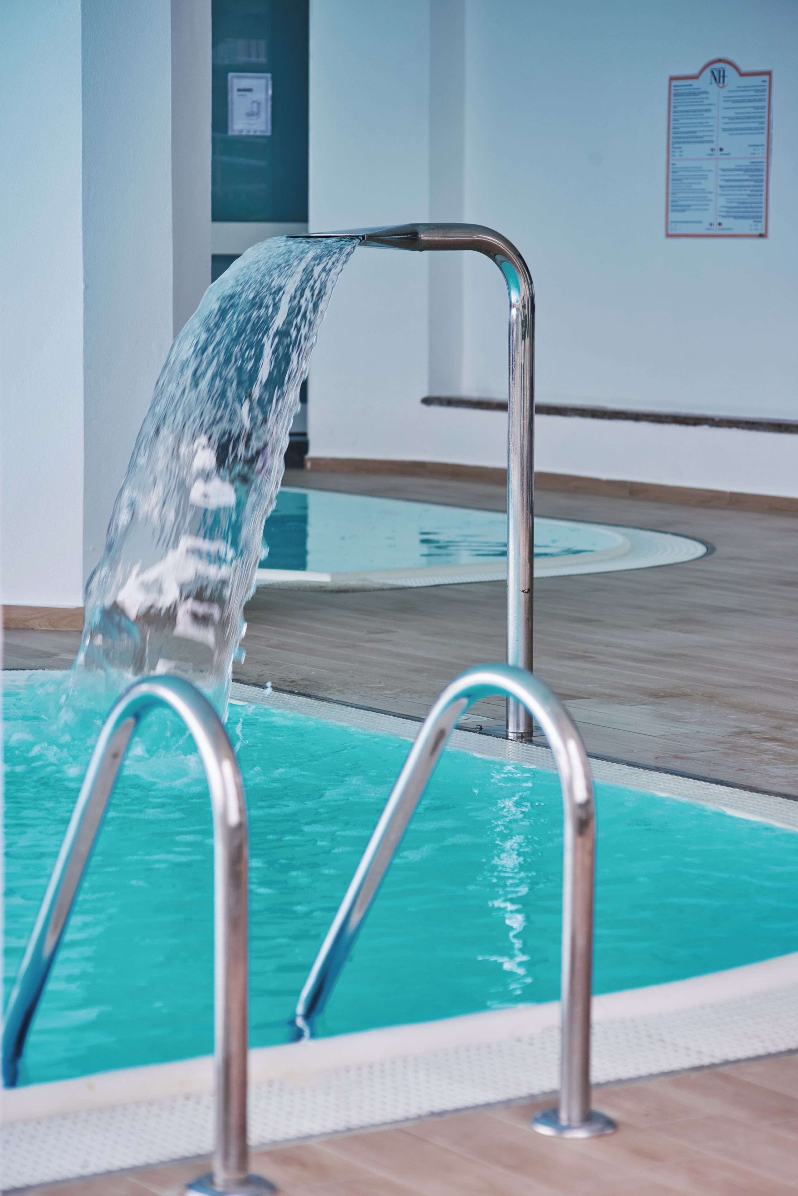 indoor pool, open 8:00 am to 7:00 pm, pool loungers