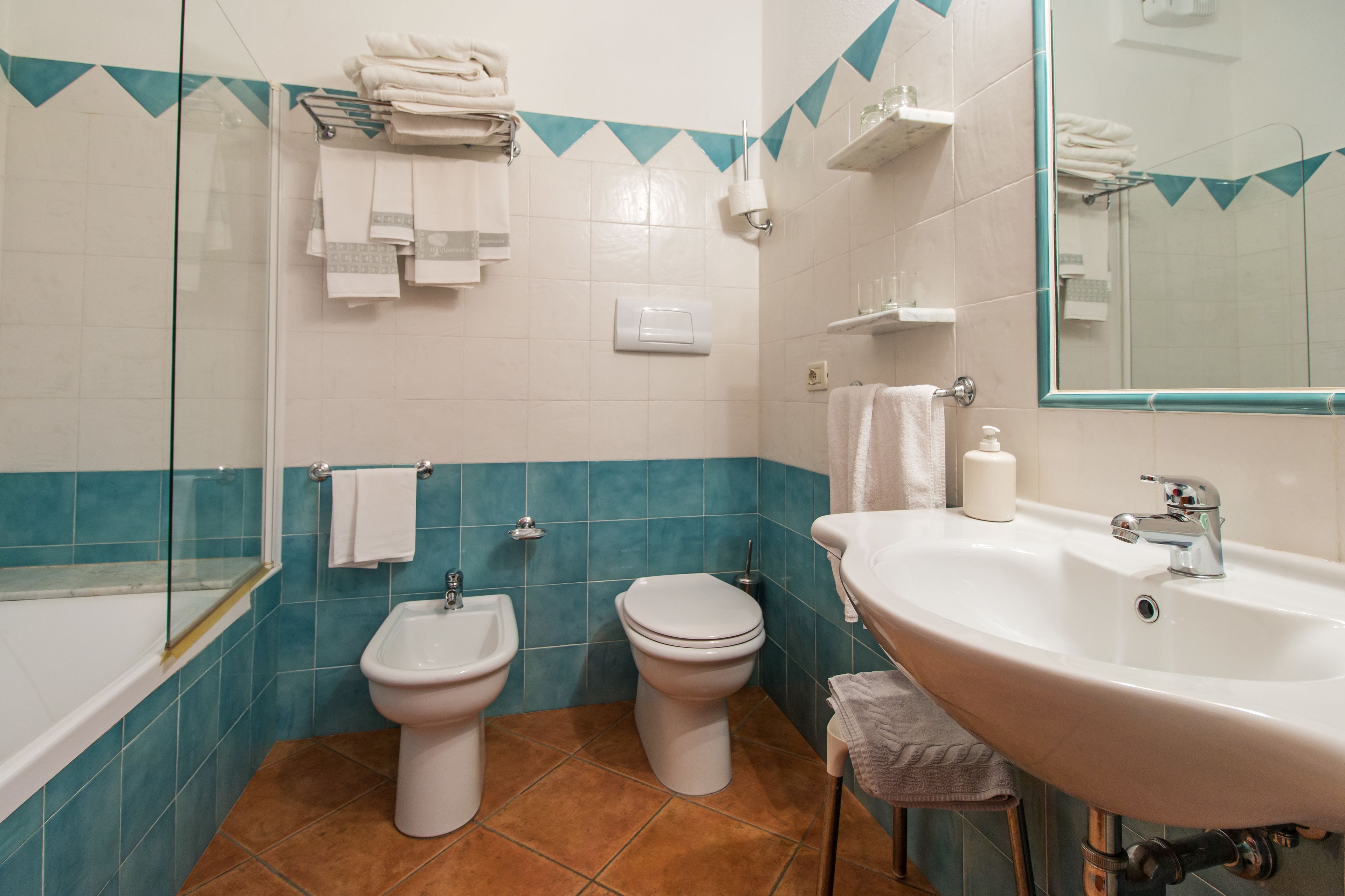 quadruple room | bathroom | free toiletries, hair dryer, bidet, towels