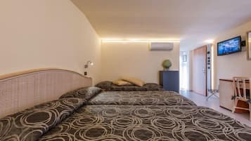 Triple Room | In-room safe, desk, soundproofing, cribs/infant beds