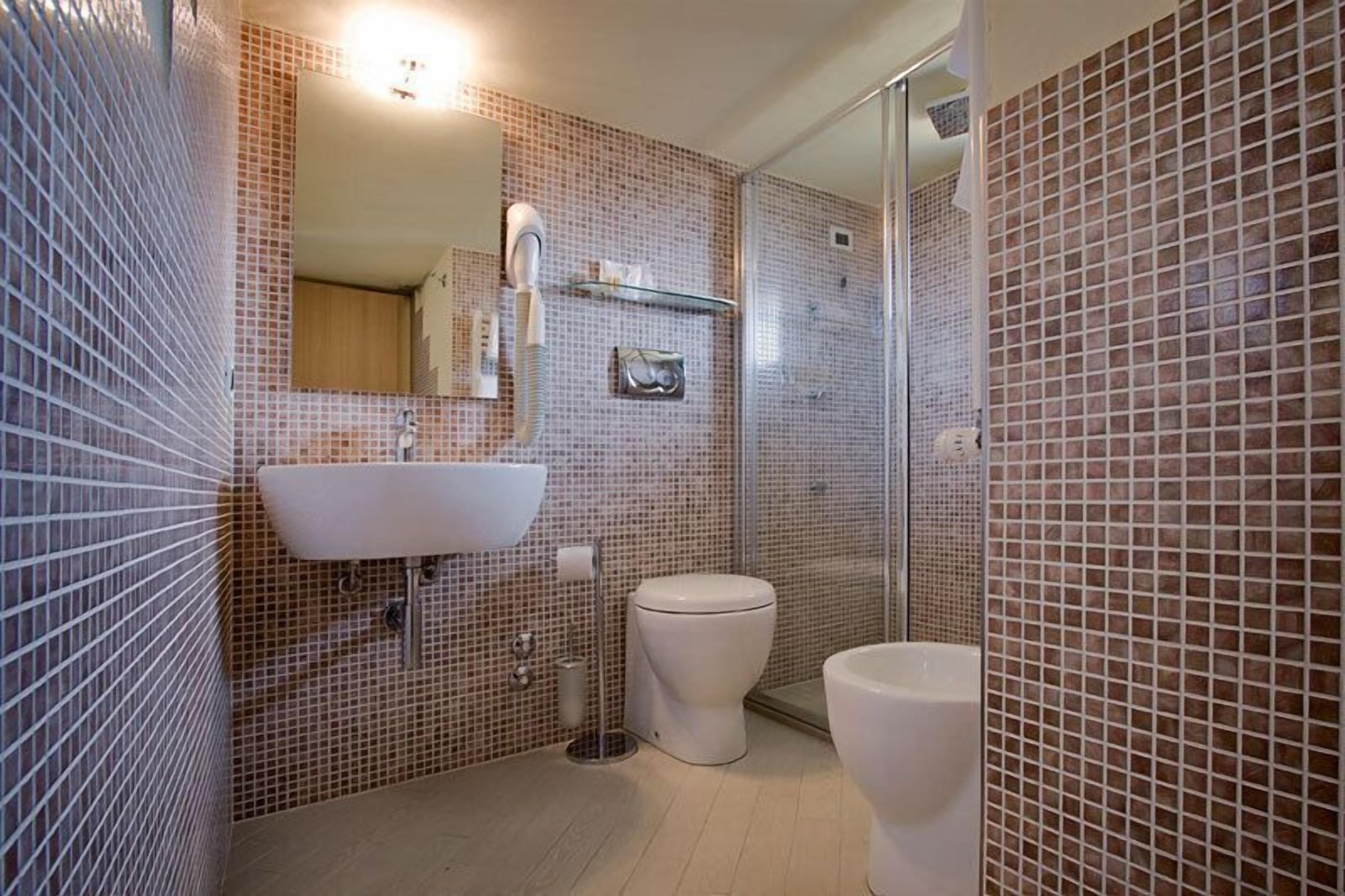 shower, free toiletries, hair dryer, slippers