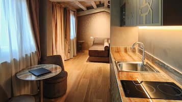 Deluxe Suite, Terrace, Annex Building (Access by stairs only) | Living area | 32-inch flat-screen TV with satellite channels