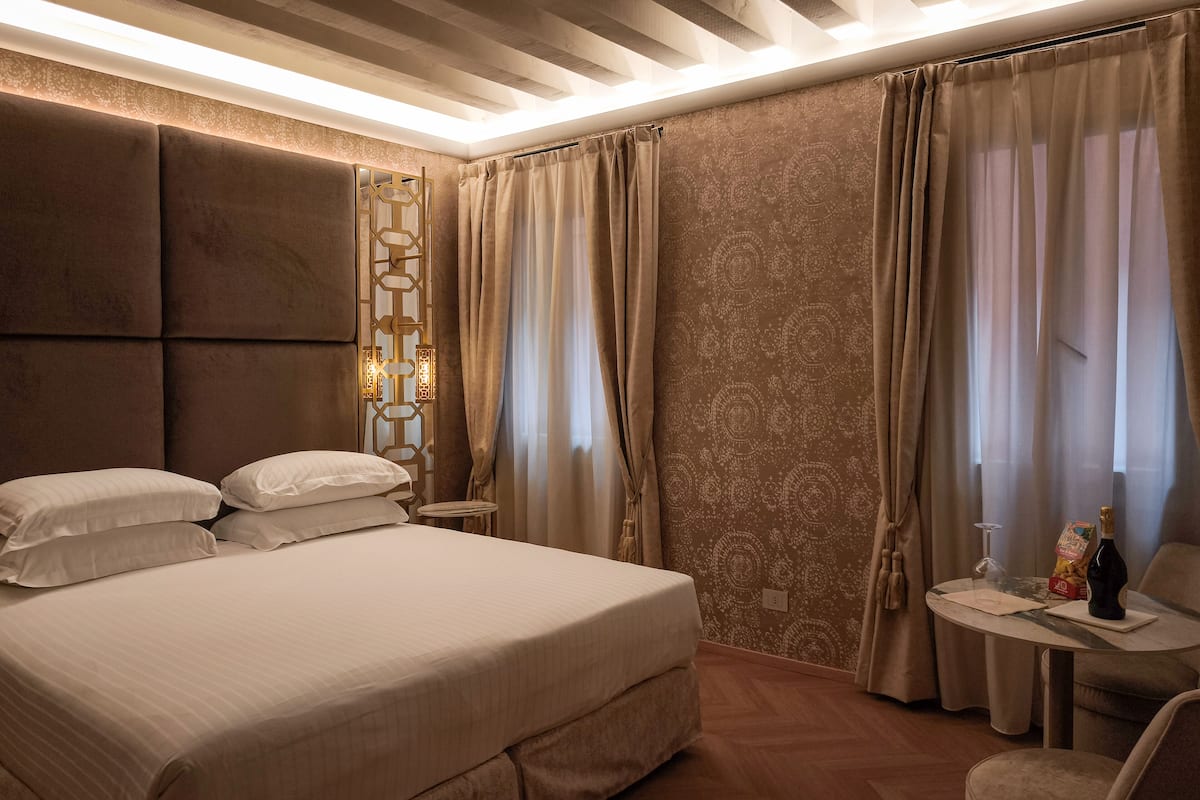 Premium bedding, down duvets, pillow-top beds, minibar