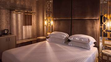 Premium bedding, down duvets, pillow-top beds, minibar