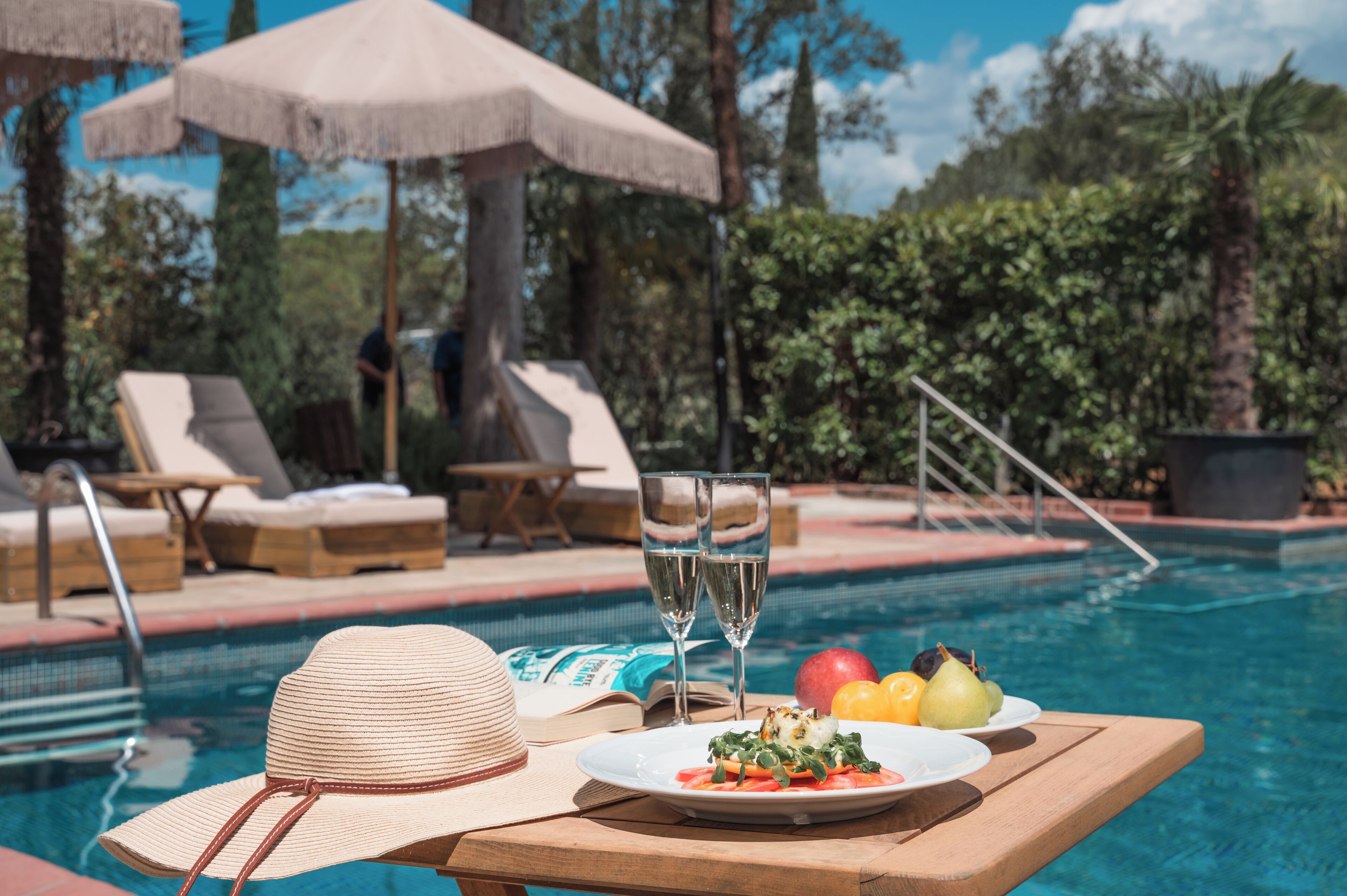 Seasonal outdoor pool, pool umbrellas, pool loungers