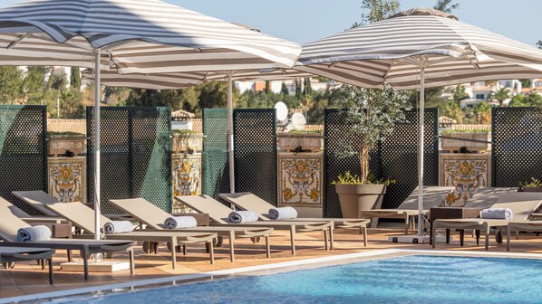 Indoor pool, 2 outdoor pools, pool umbrellas, pool loungers