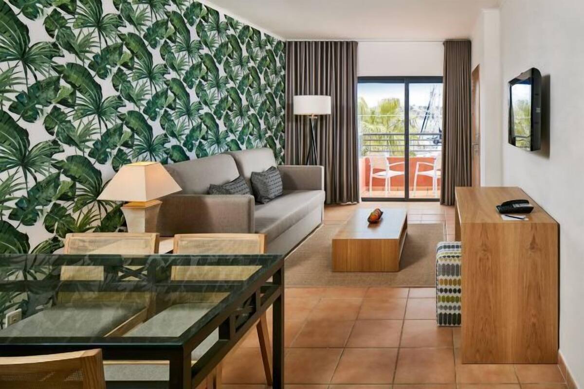 Área de estar | TV de tela plana, dock para iPod