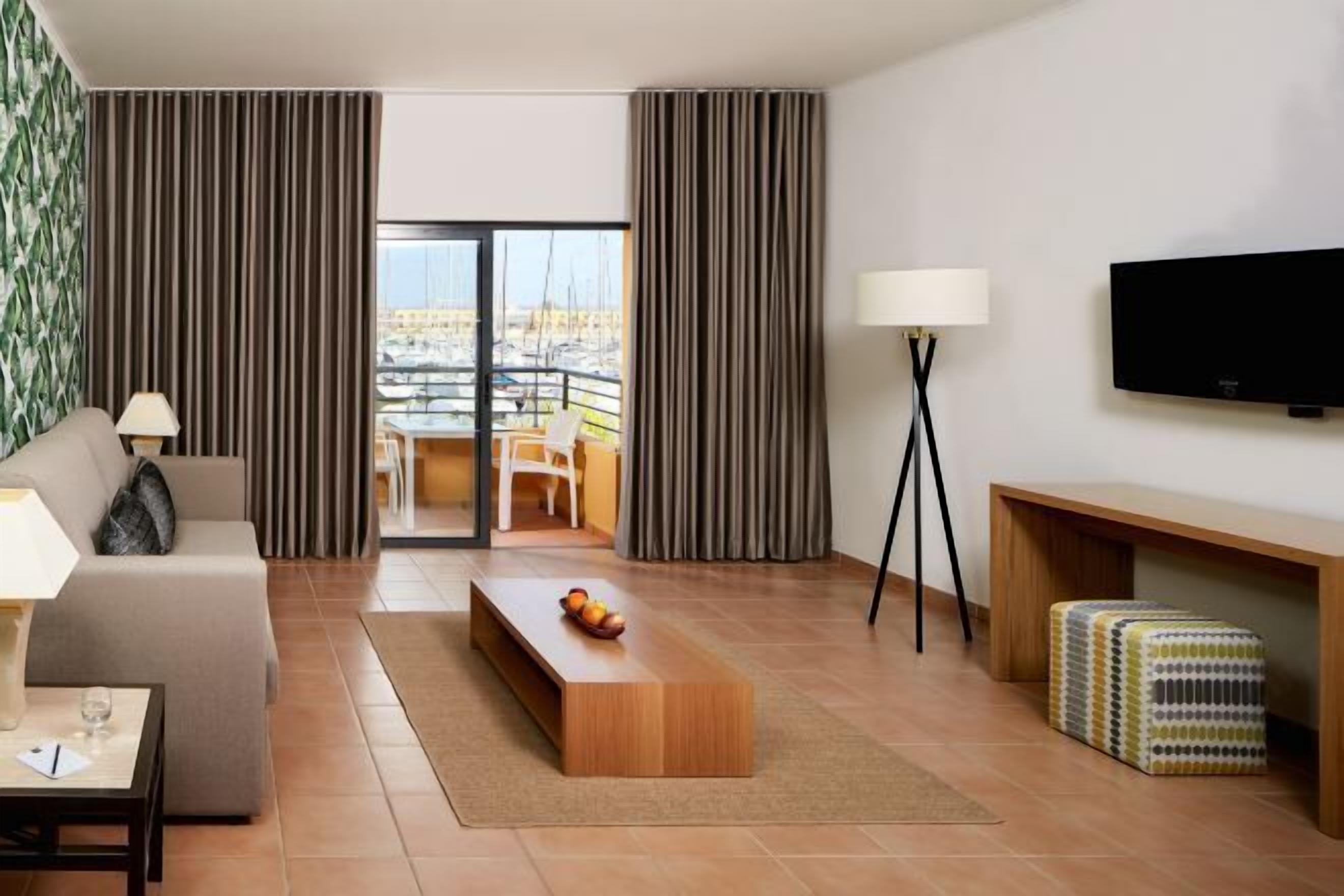 Área de estar | TV de tela plana, dock para iPod