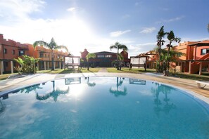 2 outdoor pools, open 9:00 AM to 7:00 PM, pool loungers