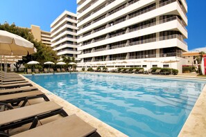 Outdoor pool, pool umbrellas, pool loungers