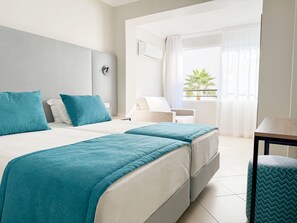 Superior Room | Minibar, in-room safe, individually decorated, individually furnished