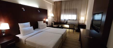 Deluxe Double or Twin Room | Minibar, in-room safe, desk, laptop workspace