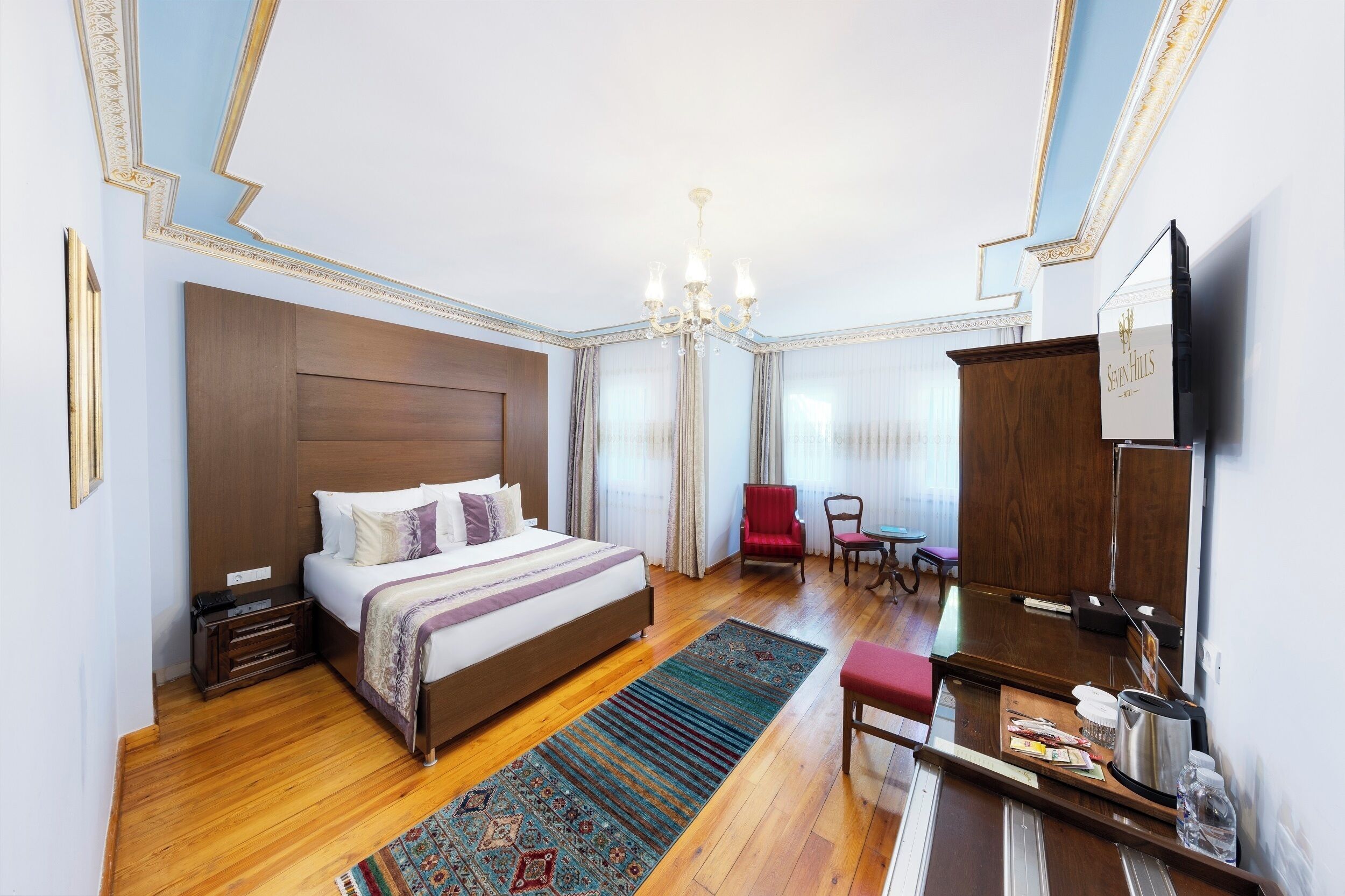 Economy Double Room | Minibar, in-room safe, individually decorated, individually furnished