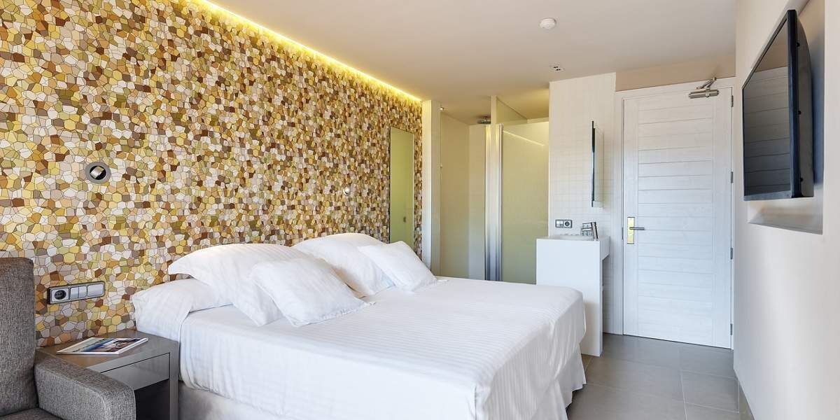 Luxe beddengoed, een minibar, een kluis op de kamer, gratis wifi