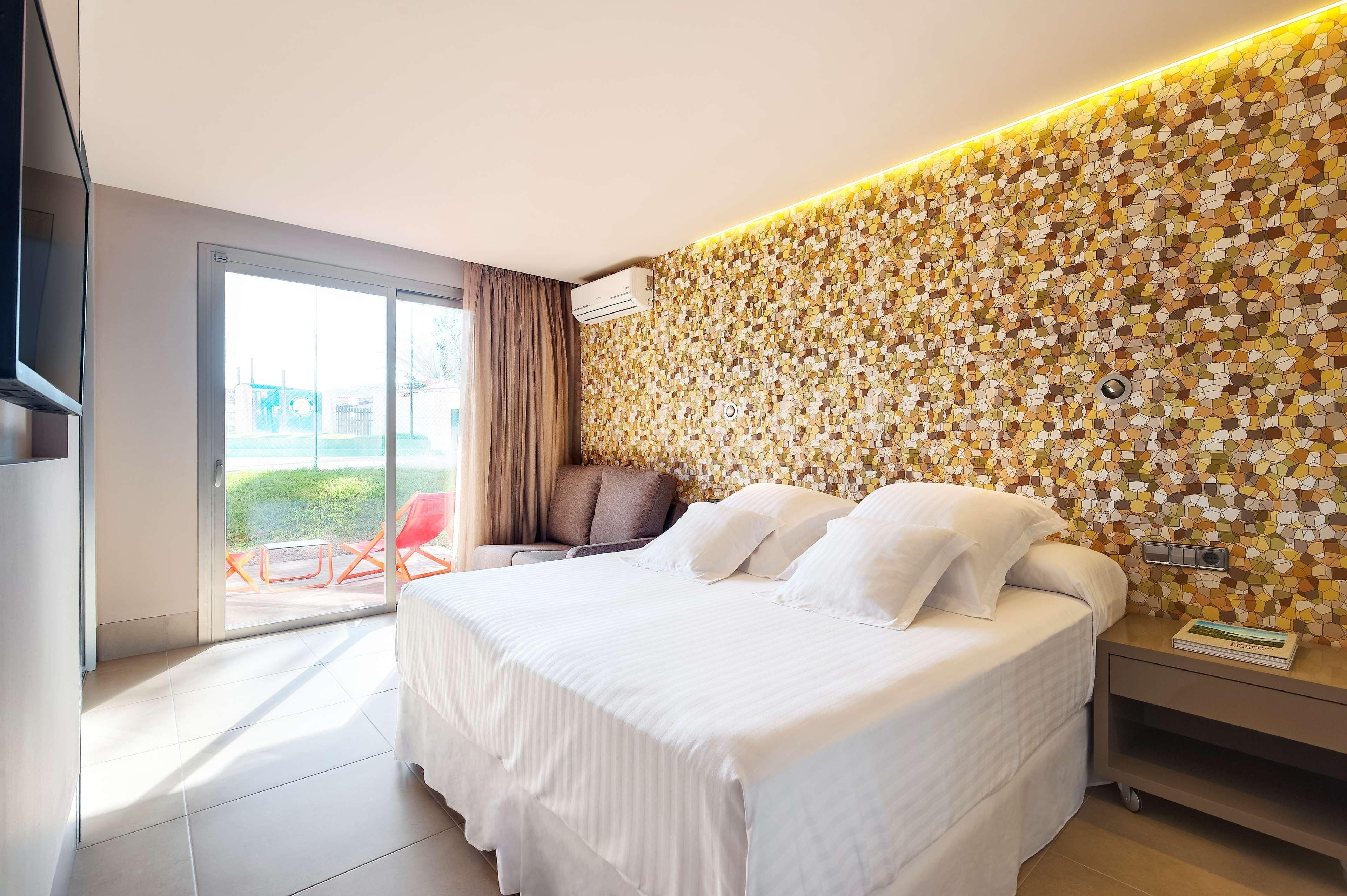 Luxe beddengoed, een minibar, een kluis op de kamer, gratis wifi