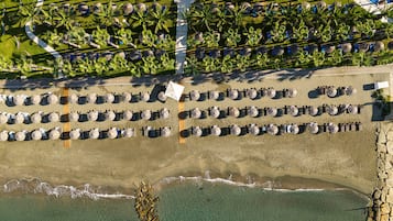 On the beach, free beach cabanas, sun loungers, beach umbrellas