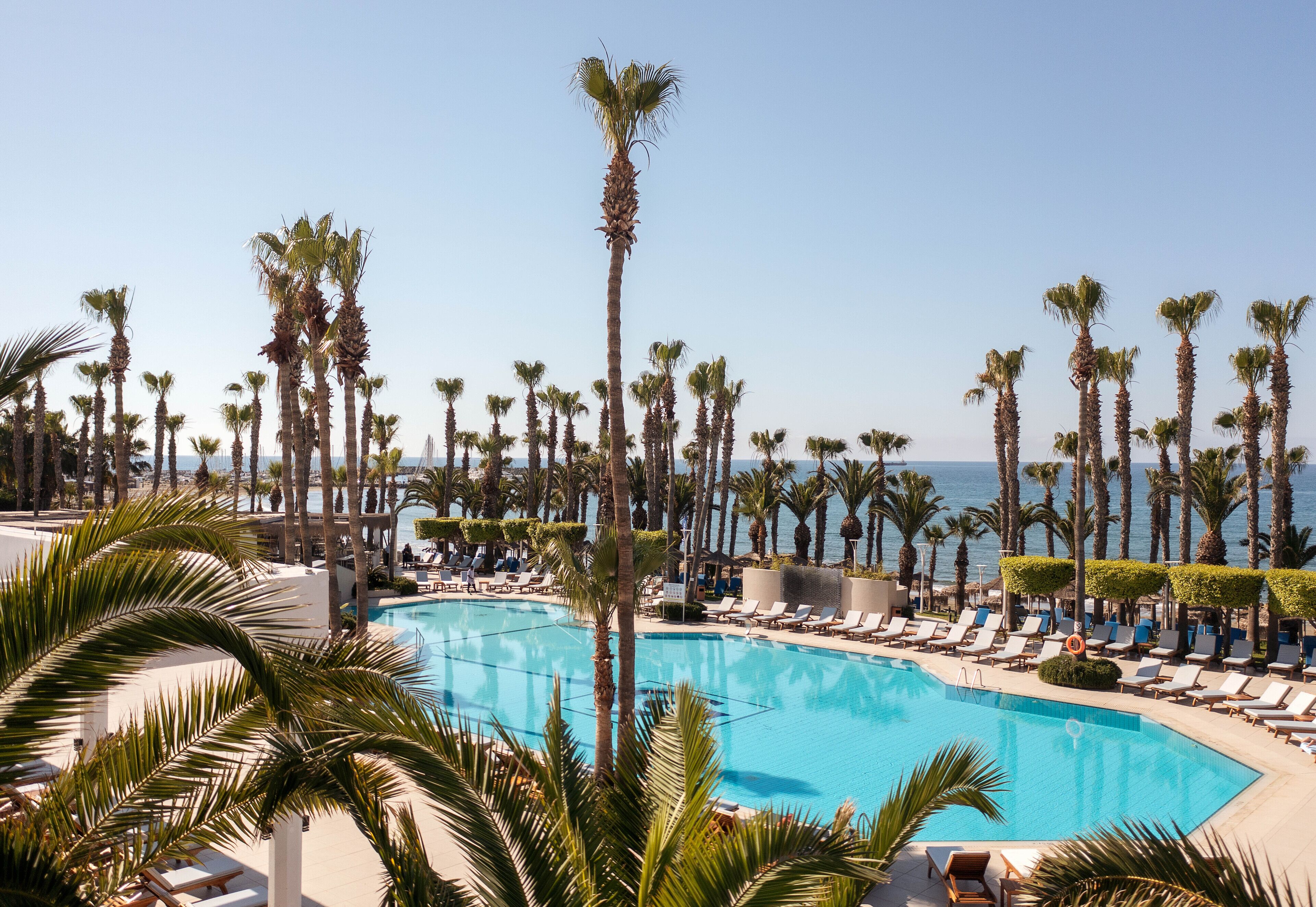 Indoor pool, outdoor pool, pool umbrellas, sun loungers