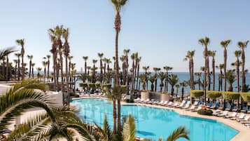 Indoor pool, outdoor pool, pool umbrellas, sun loungers