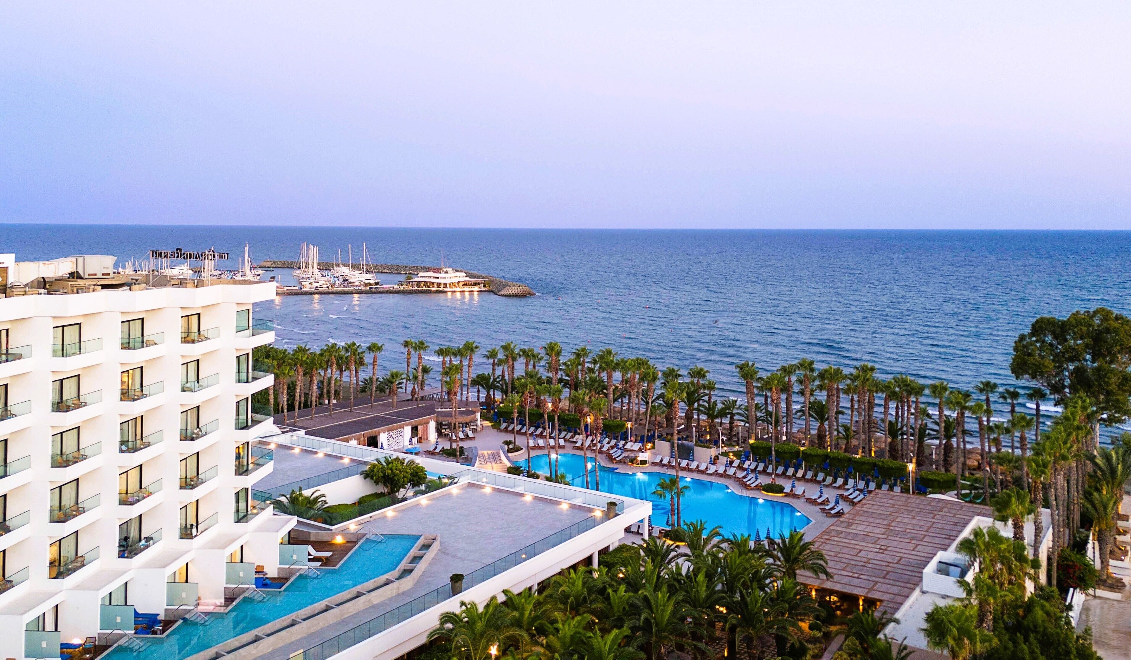 Indoor pool, outdoor pool, pool umbrellas, sun loungers