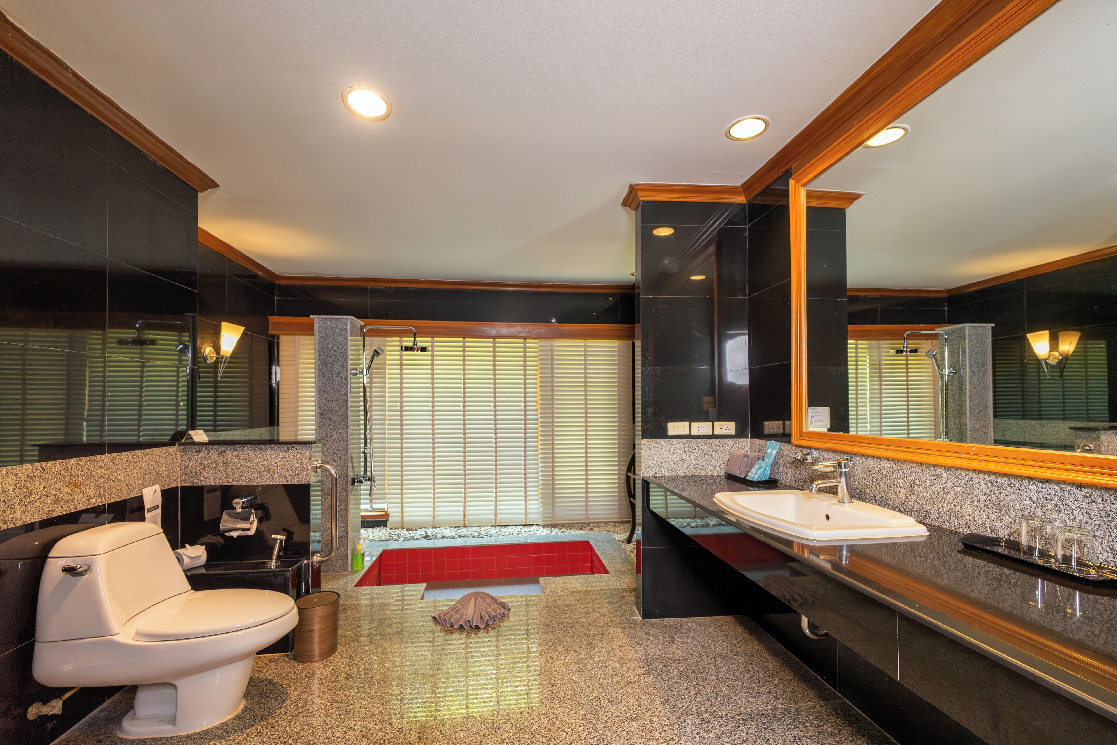 luxury grand room | bathroom | eco-friendly toiletries, hair dryer, bathrobes, slippers