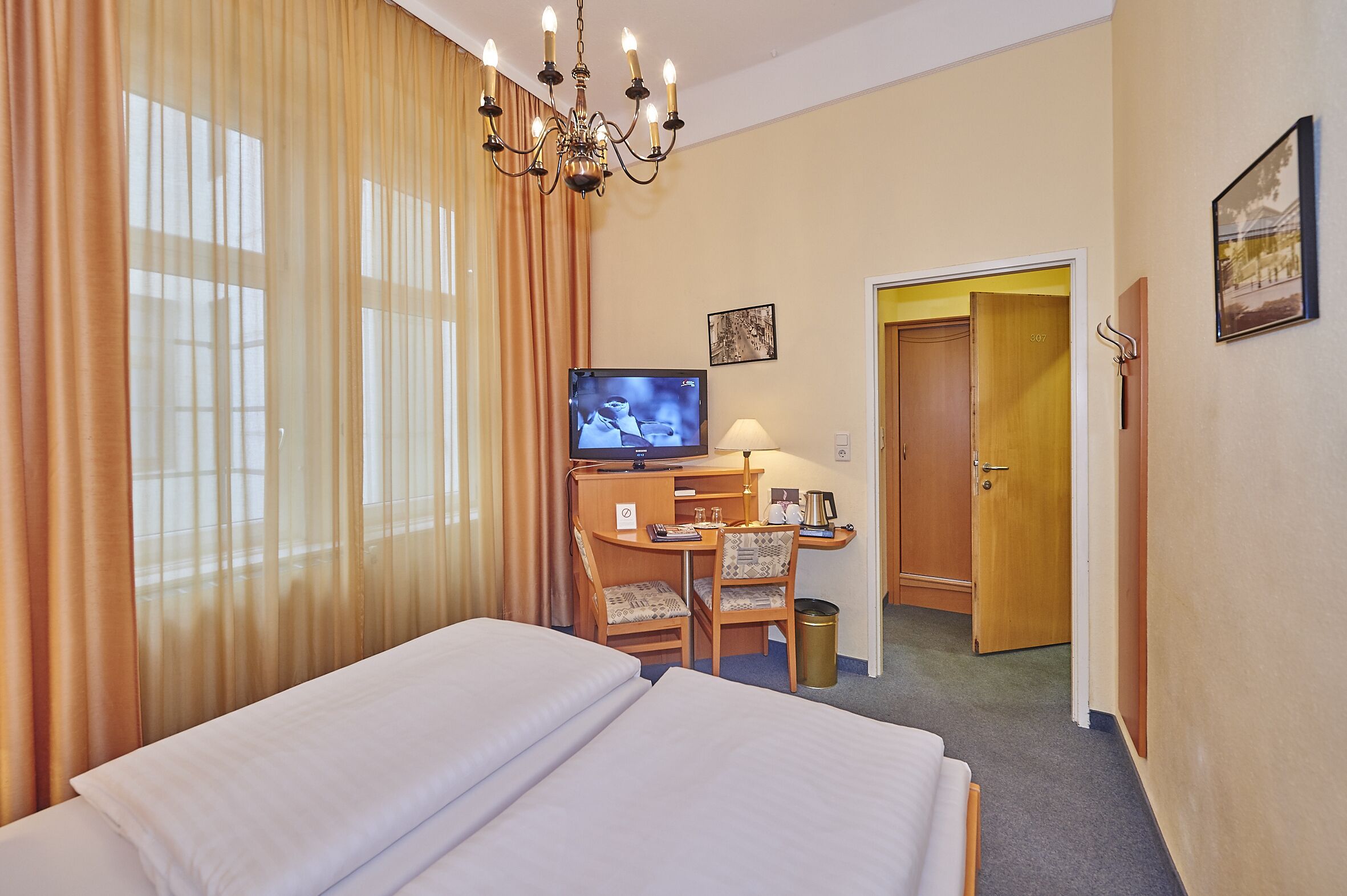standard double room | living area | 37-inch lcd tv with satellite channels, tv