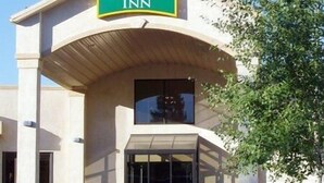 A building with a sign reading "Broadway Inn."