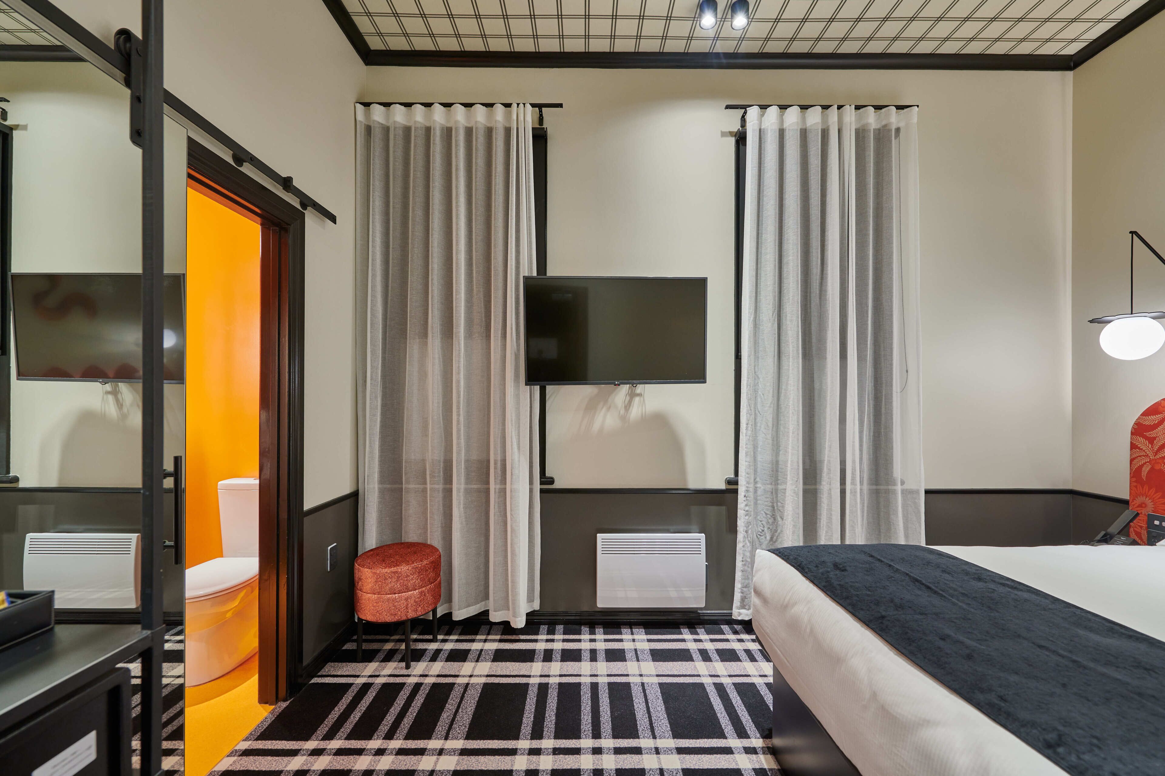 zest queen | in-room safe, individually decorated, individually furnished