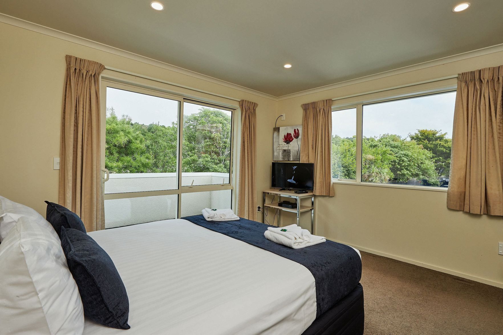 Premium bedding, blackout curtains, iron/ironing board, free WiFi