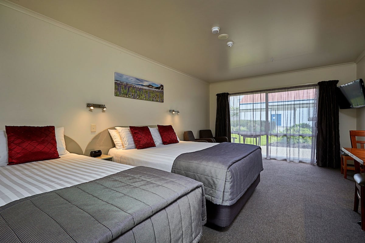 Premium bedding, blackout curtains, iron/ironing board, free WiFi