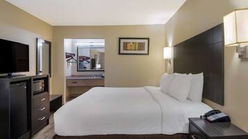 Chambre Standard, 1 trÚs grand lit, non-fumeurs, réfrigérateur et four à micro-ondes | Surmatelas, coffres-forts dans les chambres, fer et planche à repasser