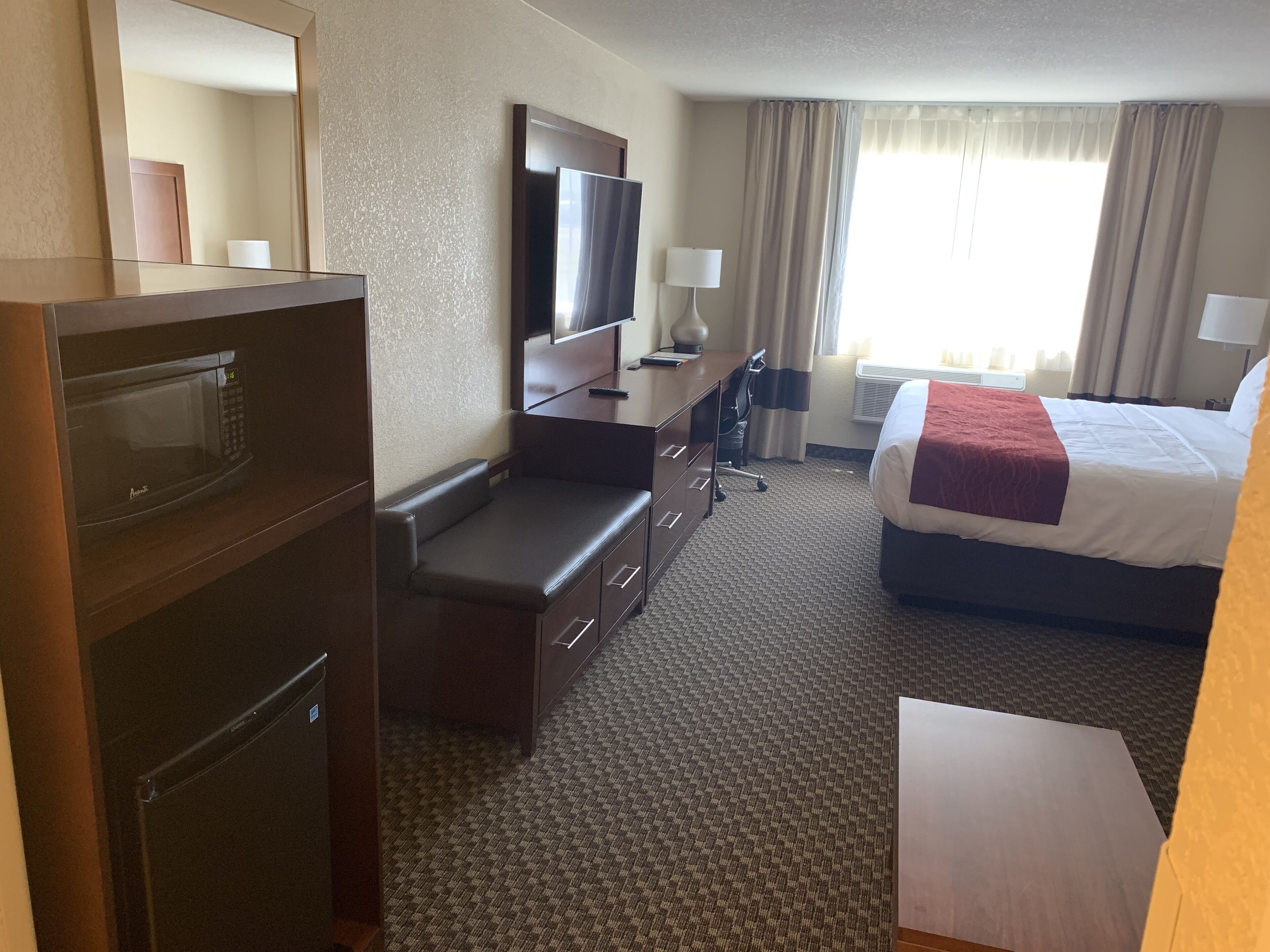 desk, laptop workspace, blackout curtains, iron/ironing board